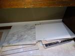 Lot of tile/ marble round table tops/wine glass rack/misc