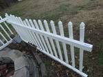 2 sections of white plastic fencing