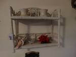 Wicker wall shelf w/ collectables