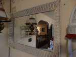 Large wicker framed wall mirror