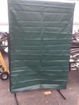 New portable divider commonly used as welding screen has many uses folds up for easy transport as pictured