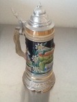 Nice stein 12 inches tall with built in music box and bottom very unique