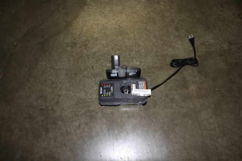 lot 2710 image: Ryobi 18 volt Battery and Charger