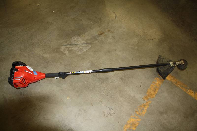 lot 2769 image: Homelite 2 cycle Gas Trimmer