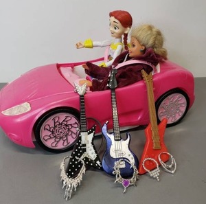 lot 36 image: Barbie Coupe w Dolls, Guitars and Necklaces - Includes Toy Story Jess Doll and Barbie
