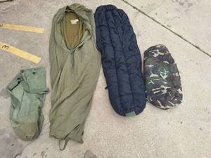 lot 106 image: Modular Nylon Mummy Sleeping Bag for Intermediate Cold, Wool Sleeping Bag, Army Issue Duffle and Triple Gear Camo Duffle with Plastic Lining
