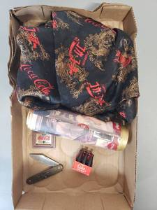 lot 437 image: Coca-Cola Theme Silk Pajama Pants XS, Wallpaper Border and 1933 Worlds Fair Single Blade Knife included