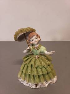 lot 451 image: Wales Stiff Lace Porcelain Figurine
