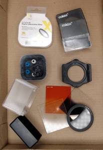 lot 68 image: Camera Filters & Ear Buds