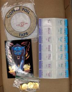 lot 69 image: NIP Copper Tape, 7 Day Pill Minder, NEW Foil Post Card & Car Wash Tokens