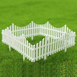 lot 1929 image: Sungmor Plastic White Edging Garden Picket Fence - Grass Lawn Flowerbed Plant Borders - Decorative Landscape Path Panels - 13in Tall, Pack of 4 (Overall Length 8 ft) - Lightweight & Easy Installation
