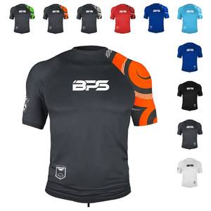 lot 50477 image: BPS Mens Short Sleeve Swim ShirtRash Guard with Sun Protection (Patterned Charcoal Orange, S)
