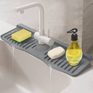 lot 50698 image: Silicone Draining Mat for Kitchen Sink 19.6x5.1 inch, 5°Slope Kitchen Sink Splash Guard, Faucet Mat Sink Protectors for Kitchen Sink, Faucet Drain Pad Sink Mat for Kitchen Bathroom Faucet Draining Mat