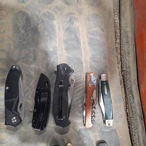 lot 7003 image: Lot Of Various Used Pocket Knives