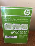 Four packs of 180 sheets of HP photo paper 4x...