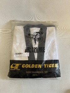 lot 96 image: KARATE & MARTIAL ARTS COMBAT UNIFORM SET- GOLDEN TIGER HEAVY UNIFORM