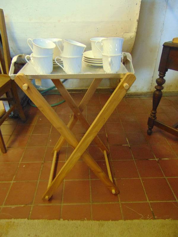 lot 8027 image: Aluminum serving tray 17-12x 11-12 w wooden stand 27-12 T and Gibson dishes (8) cups, (8) saucers