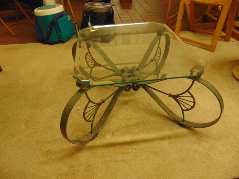 lot 8082 image: Beveled glass top coffee table w decorative metal base 28 x 24 x 16