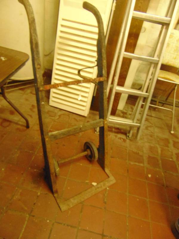 lot 8103 image: Antique 2- wheel Dolly, Wooden Handles Const. Company, 48 tall