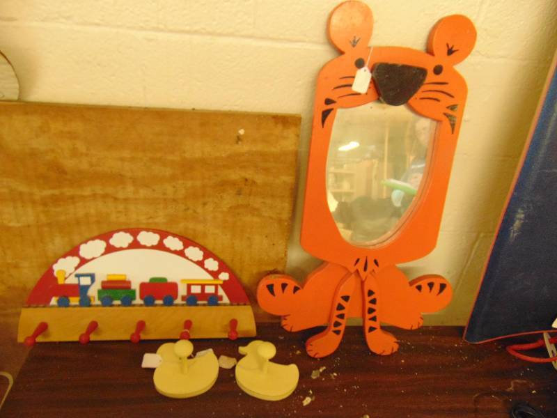 lot 8160 image: (4) ct. lot wooden pegs and wooden Tiger mirror