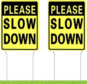 lot 11166 image: Kichwit 2 Pack Double Sided Please Slow Down Sign Plastic Yard Signs with Metal Stakes, Sign Measures 11.8 x 15.7 Inches
