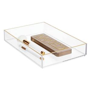 lot 12287 image: mDesign Wide Makeup Organizer Tray for Bathroom Drawers, Vanity, Countertop - Storage Bins for Makeup Brushes, Eyeshadow Palettes, Lipstick, Lip Gloss, Concealers - ClearSoft Brass