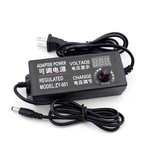 lot 13009 image: Yetaida 100-240V to 3-12V 5A Universal Adjustable ACDC Switching Power Adapter, 50-60hz Power Supply Adapter Converter with LED Voltage Display US Plug (3V-12V 5A)