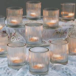 lot 42434 image: 36 Pcs Votive Candle Holders - Clear Glass Tea Lights Candle Holder in Bulk for Table Centerpiece, Tealight Candle Holder for Weddings, Home Decor, Baby Shower, Special Occasions (Clear, 36) Retail $40