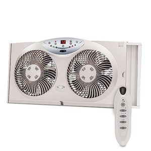 lot 42441 image: Bionaire 8.5 Twin Window Fan with Reversible Airflow, 3 Speeds, Retail $65