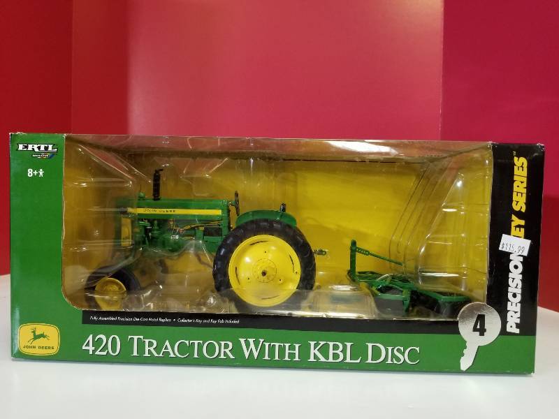 lot 5017 image: Ertl Precision Key Series John Deere 420 Tractor w3 point mounted disc, 116 scale, #15851, NIB