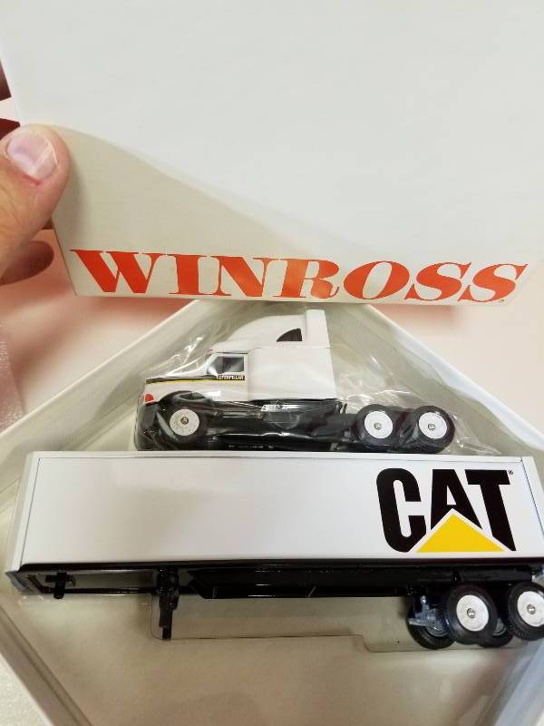 lot 5031 image: Winross Semi, CAT ,  164 scale, NIB