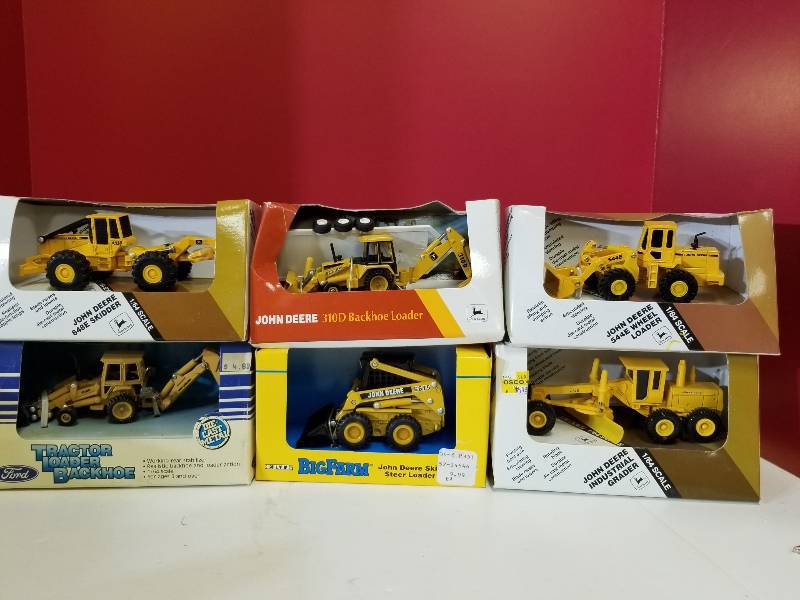 lot 5130 image: ERTL, 6 items, 2 backhoe, 1 skid loader, 1 skidder, 1 wheel loader, 1 grader, #5540, 5539, 5790, 5605, 885, 5521, 164 scale, NIB