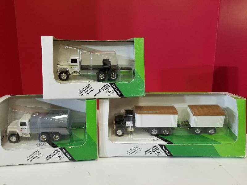 lot 5131 image: ERTL, 3 items, 1 JD Grain Truck wPup, 1 Milk Tanker, 1 Imp Halling Flatbed, #5545, 5542, 5543, 164 scale, NIB