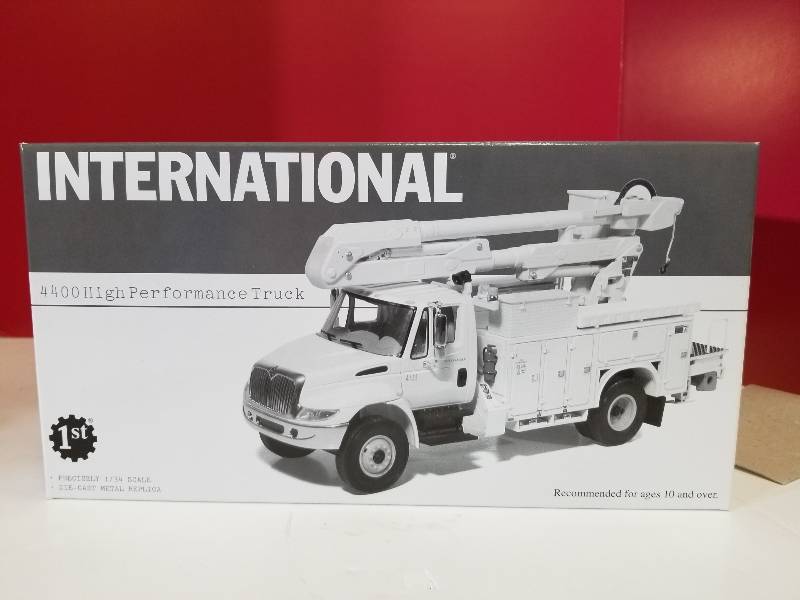 lot 5139 image: First Gear International 4400 High Performance Bucket Lineman Truck, #19-2827, 134 scale, new in shipping box & NIB