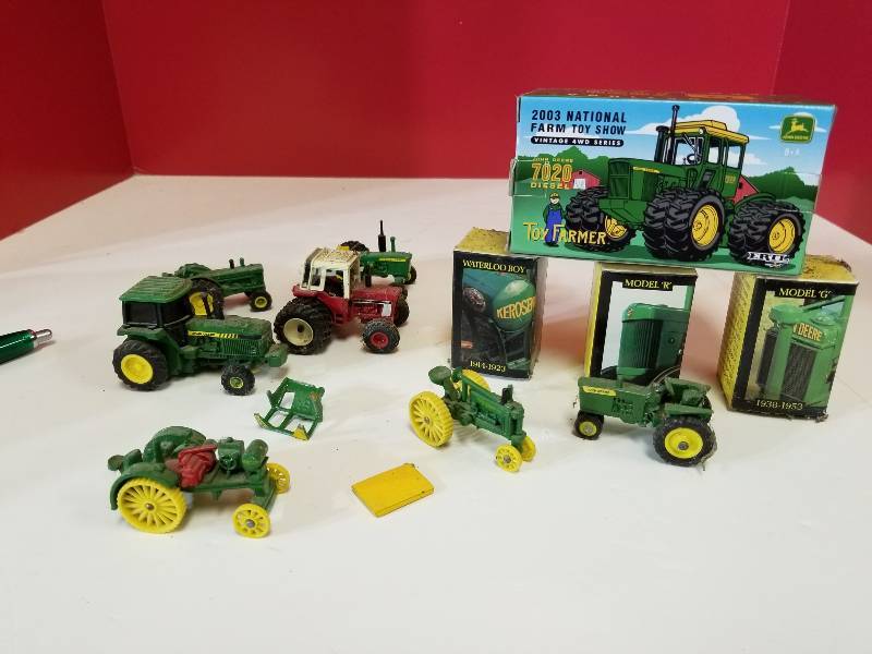 lot 5153 image: ERTL, 1 lot 7 small Tractors, some damaged, see PIX