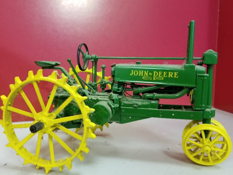 lot 5186 image: ERTL John Deere General Purpose Tractor, steel wheel, float drawbar, 116 scale, No box and dusty