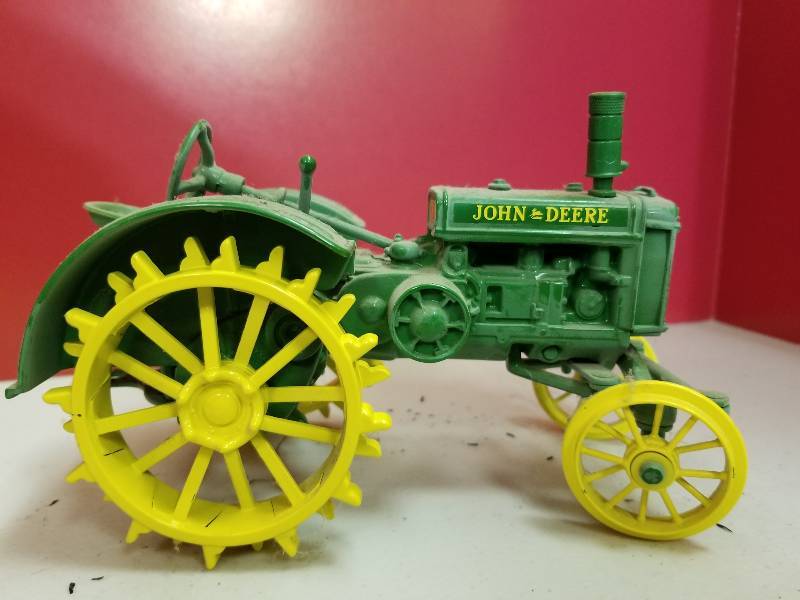 lot 5191 image: ERTL John Deere General Purpose Tractor, steel wheel, 116 scale, No box and dusty