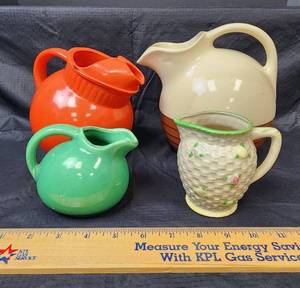 lot 124 image: (4) Vintage Pitchers