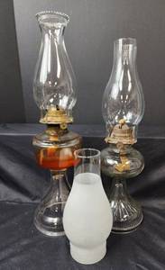 lot 127 image: (2) Vintage Oil Lamps and Extra Globe