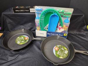 lot 248 image: (2) New Ozark Trail 10.5 Cast Iron Skillets, NIB BBQ Grill Mat, and New BBQ Set