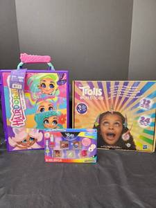 lot 250 image: New Hairdorables Doll Case, NIB Trolls World Tour, and NIB Trolls Dolls
