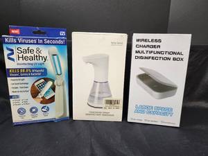 lot 269 image: NIB Safe & Healthy Disinfecting UV Light, NIB Wireless Charger Multifunctional Disinfection Box, and NIB Touchless Spray Disinfectant Dispenser