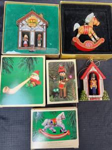 lot 342 image: Vintage Hallmark Ornaments - 1976 Guard House (no box), 1978 Rocking Horse (with box), Clothespin Drummer Boy (with box), Alpine Elf (with box), and 1977 Boy & Girl Twirl About (with box)