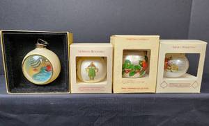 lot 344 image: Vintage Hallmark Ornaments with Boxes - 1983 Mary Hamilton, 1984 Norman Rockwell, 1978 Ice Skating Elf, and 1980 Christmas Cardinals