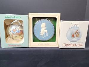 lot 345 image: Vintage Ornaments with Boxes - 1976 Schmid Sacred Journey, 1984 Ida Bohatta Noel, and 1981 Betsey Clark Cameo Keepsake