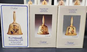 lot 349 image: Vintage Goebel Bells in Boxes - 1986 9th Edition Annual Bell in bas - relief, 1984 7th Edition Annual Bell in bas - relief, and 1985 8th Edition annual Bell in bas - relief