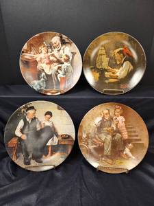 lot 373 image: Norman Rockwell Plates (original box and certificates of authenticity) - The Lighthouse Keepers Daughter 1979 11346M, The Toymaker 1977 3841S, The Cobbler 1978 14997G, and The Ship Builder 1980 400AB