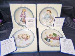 lot 381 image: Schmid Christmas Plates - Angelic Musician 1989, Angels Light 1989, Cheerful Cherubs 1988, and Angelic Gifts 1987