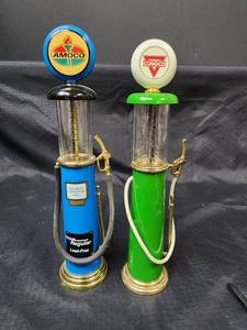 lot 434 image: Vintage Conoco Die Cast Gas Pump and Vintage Amoco Die Cast Gas Pump