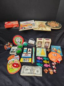 lot 437 image: Marbles, Handheld Puzzle Set, Play Money, Yo-Yos, Crayons, Chalk, Pencils, Books, and More